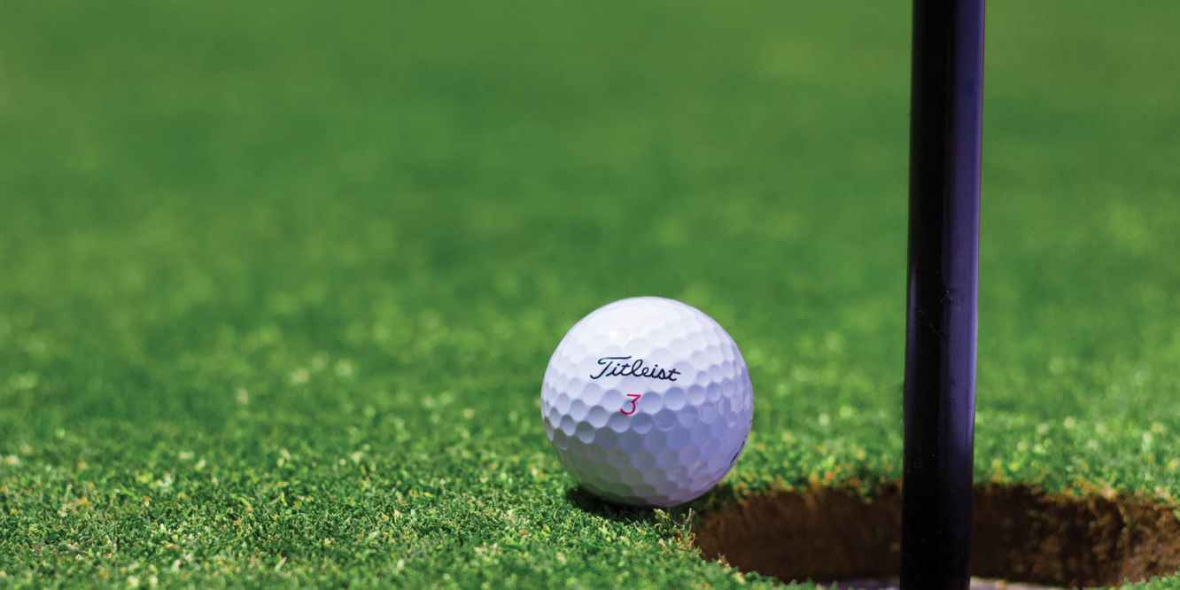 Golf Ball Representing Golf Games